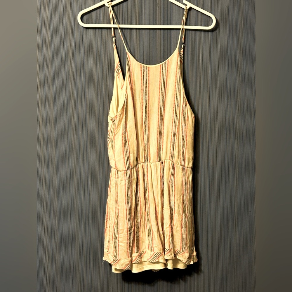 Everly short romper, scoop necked and lettuce edged bottoms. Size M